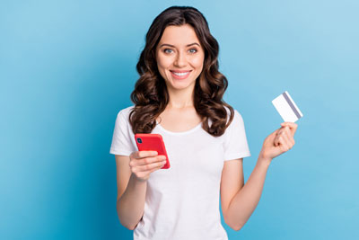 Photo: Woman paying bill online